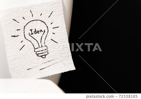 Lightbulb drawn on toilet paper, stock photo Lightbulb drawn on toilet paper, stock photo 72338185