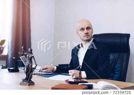 Lawyer working with documents in office. Justice and Agreement concept. Lawyer working with documents in office. Justice and Agreement concept. 72339728