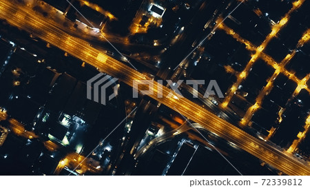 Top down night traffic highway with illuminated city streets aerial. Philippines downtown cityscape 72339812
