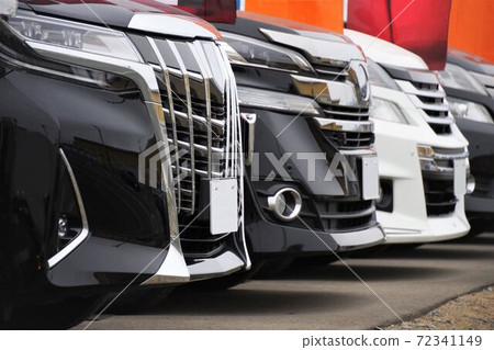Cars lined up at dealers Minivans Toyota cars 72341149
