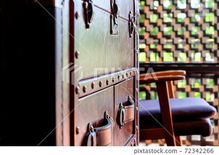Vintage leather cabinet with Classic chair in luxury bedroom Vintage leather cabinet with Classic chair in luxury bedroom 72342266