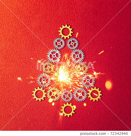 Christmas Tree gears with sparkler on red textured background 72342940