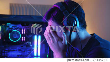 asian gamer has eyes pain 72345765