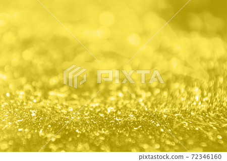 shining textured background in illuminating yellow color 72346160