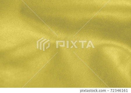 illuminating yellow leather texture. trendy color of 2021 72346161