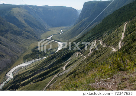 The Katu-Yaryk pass in Altai. Russia. Siberia. Travel. Mountain road serpentine. The Katu-Yaryk pass in Altai. Russia. Siberia. Travel. Mountain road serpentine. 72347625