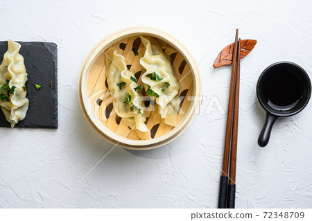 Close up fresh boiled gyoza dumplings in wooden 72348709