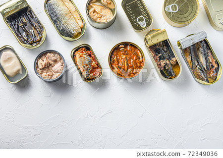Cans with different preserve of fish and conserve 72349036