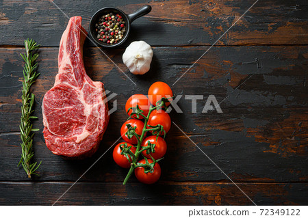 Raw uncooked black angus Dallas steak in rustic 72349122
