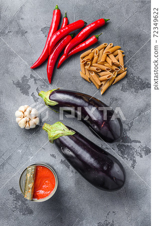 Aubergine penne arrabiata ingredients, top view 72349622