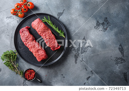 Organic denver steak on black plate , marbled beef Organic denver steak on black plate , marbled beef 72349713