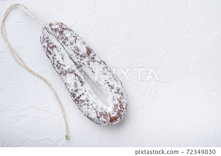 Salami sausage fuet on white background with space 72349830