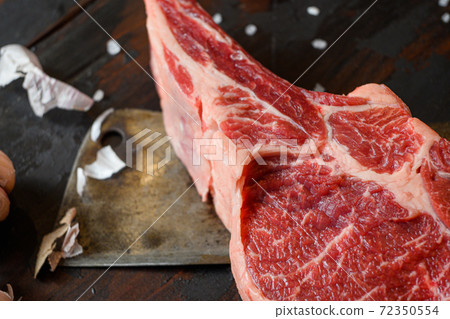 Raw beef Dallas steak, which lies on the cutting 72350554