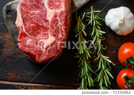 Fresh tomahawk steak on meat cleaver. Organic farm 72350862