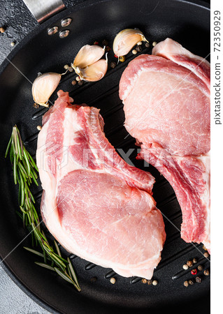 Porco Iberico French Racks in frying pan with 72350929