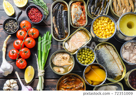 Canned preserves food in tin open cans. with fresh 72351009