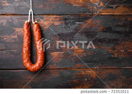 Chorizo sausage on wooden background with copy 72351011