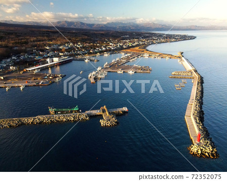 Aerial view of the morning scenery of Sawara Port, Mori Town, Hokkaido in early winter 72352075