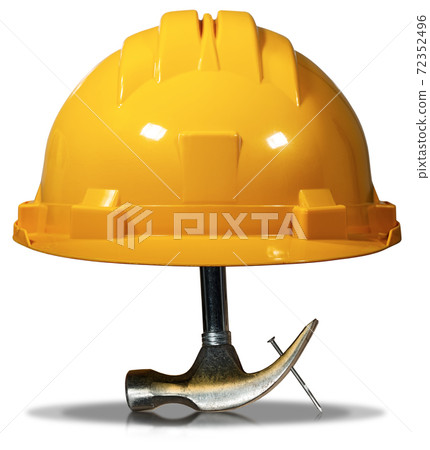Yellow Safety Helmet with a Hammer that Removes a Nail - Isolated Yellow Safety Helmet with a Hammer that Removes a Nail - Isolated 72352496