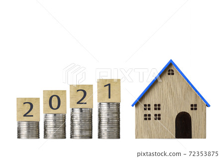Business investment and saving growth year 2021 for advertising concept. Stacking coin growing with house model on isolated white background studio meaning of financial real estate advertising concept Business investment and saving growth year 2021 for advertising concept. Stacking coin growing with house model on isolated white background studio meaning of financial real estate advertising concept 72353875