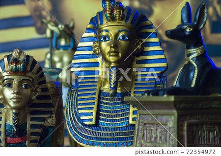 Statues of tutankhamun and mythology anub in blue 72354972