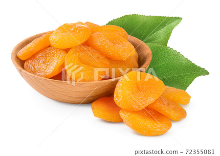 Dried apricots in wooden bowl isolated on white background with clipping path and full depth of field. 72355081