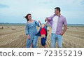 parenting, mother and father hold their son hands and throw up 72355219