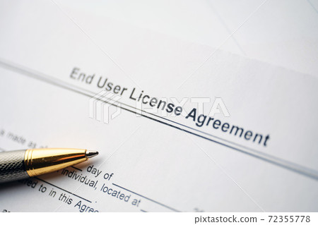 Legal document End User License Agreement on paper close up Legal document End User License Agreement on paper close up 72355778