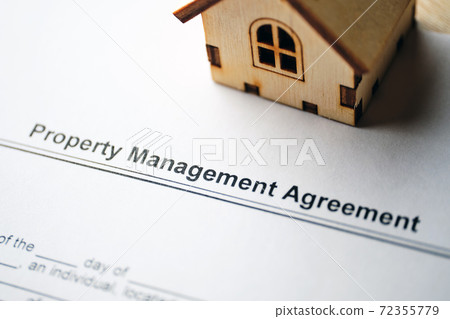 Legal document Property Management Agreement on paper close up Legal document Property Management Agreement on paper close up 72355779