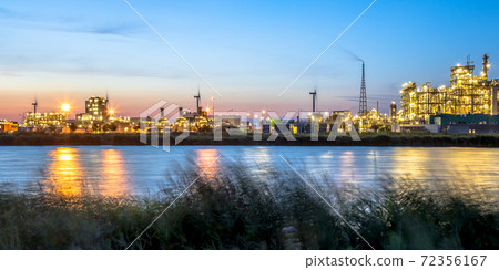 Chemical plant long exposure landscape at dusk 72356167
