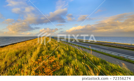 Afsluitdijk dutch dike sunset Afsluitdijk dutch dike sunset 72356274