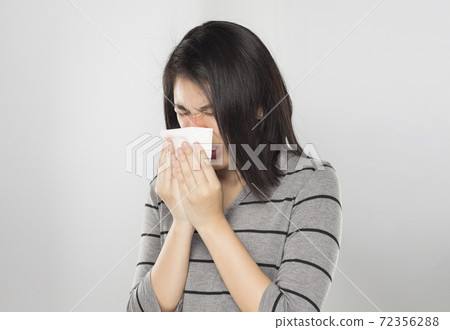 young asian woman feel sick 72356288