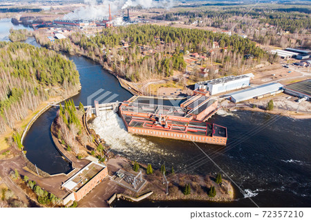 Aerial view of hydroelectric power generation plant and Ankkapurha Industrial Museum at Kymijoki river, Finland. Aerial view of hydroelectric power generation plant and Ankkapurha Industrial Museum at Kymijoki river, Finland. 72357210