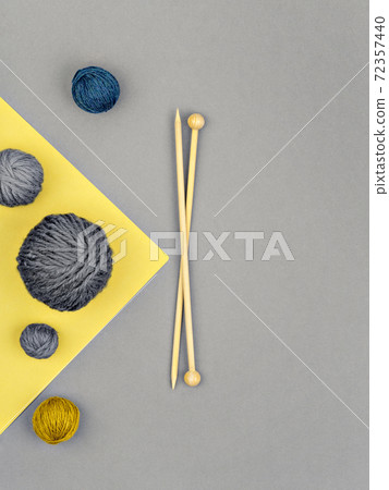 Yarn on illuminating and ultimate gray backdrop. Yarn on illuminating and ultimate gray backdrop. 72357440