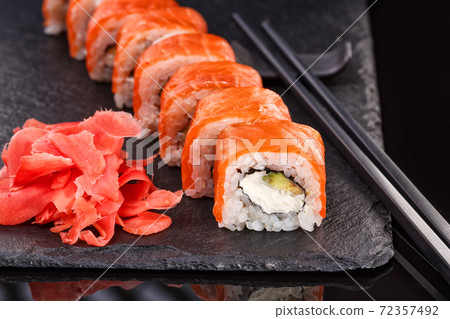 Beautiful Philadelphia rolls with salmon and cream Beautiful Philadelphia rolls with salmon and cream 72357492