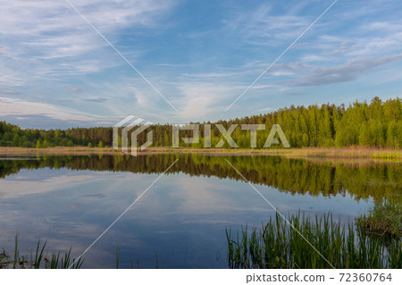 beautiful view of the lake on a warm summer day 72360764