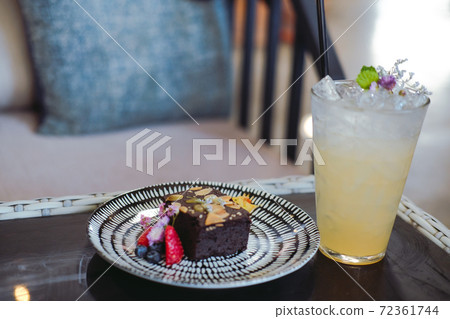 dark chocolate homemade keto vegan flourless brownie with lemon beverage drink dark chocolate homemade keto vegan flourless brownie with lemon beverage drink 72361744