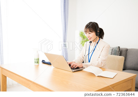 Female operator working online 72363644