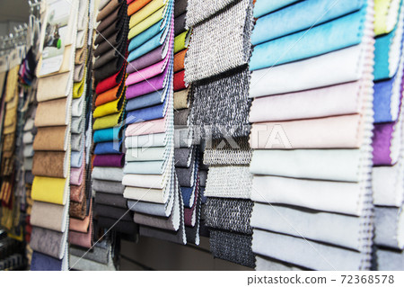 A set of fabric samples for furniture finishing. Multicolored upholstery stripes. 72368578
