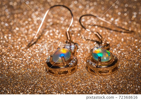 Gold earrings with fire opal 72368616