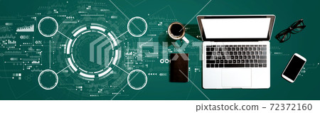 Tech circle with a laptop computer 72372160