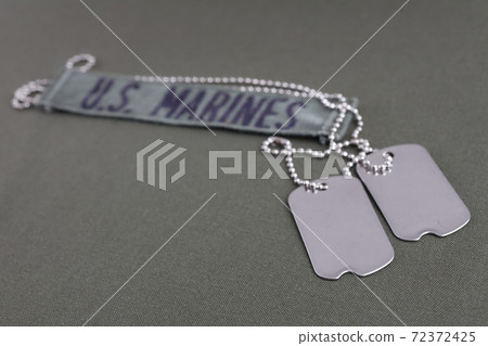 U.S. MARINES Branch Tape with dog tags on olive drab uniform 72372425