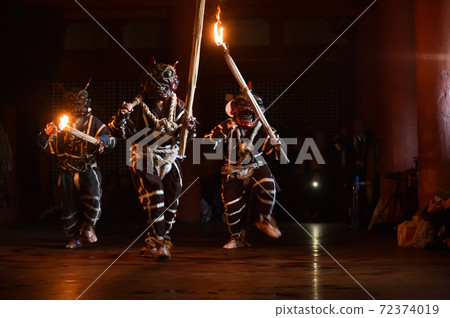 Demon Taisanji's religion ceremony, dancing with a torch and dispelling evil spirits 72374019