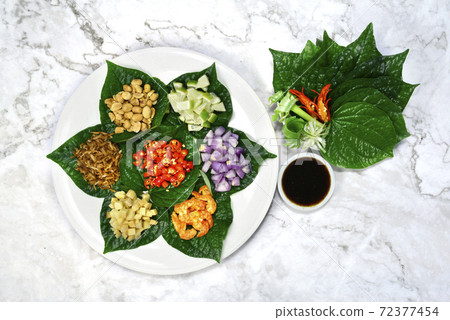 Savoury Leaf Wraps (Miang Kham) Savoury Leaf Wraps (Miang Kham) 72377454