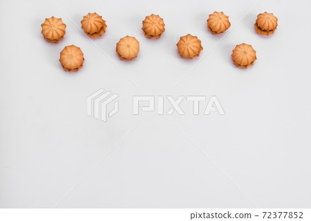 Cookies isolated on white background. On a white background with space for text. Top view. Cookie banner. Cookies isolated on white background. On a white background with space for text. Top view. Cookie banner. 72377852