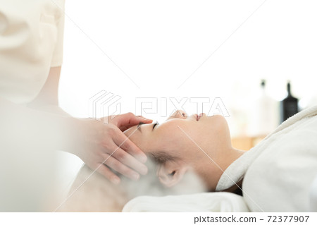 A woman relaxing with beauty treatment A woman relaxing with beauty treatment 72377907
