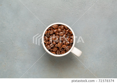 Coffee beans and mugs Coffee beans and mugs 72378374