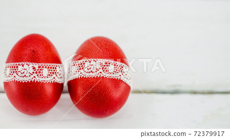 Red Easter eggs on a white background 72379917