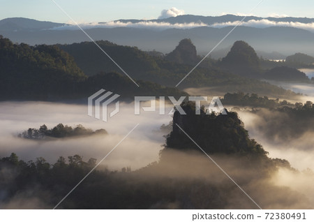 Mountain landscape and morning mist. Mountain landscape and morning mist. 72380491