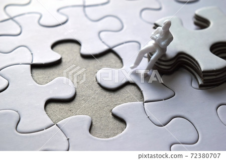 Jigsaw puzzle and human figure 72380707